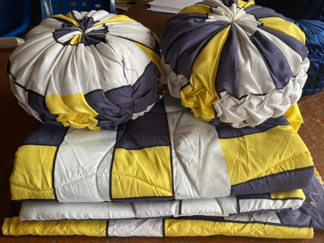 Handmade bedding and pillows from skills training